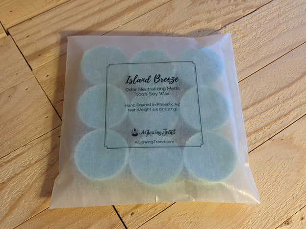9-pack of light blue odor neutralizing Island Breeze fragranced wax tart melts.