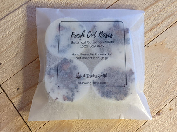 4-pack of white Fresh Cut Roses fragranced wax tart melts with rose petals in the wax.