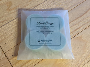4-pack of light blue odor neutralizing Island Breeze fragranced wax tart melts.