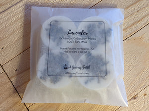 4-pack of white Lavender fragranced wax tart melts with lavender buds in the wax.