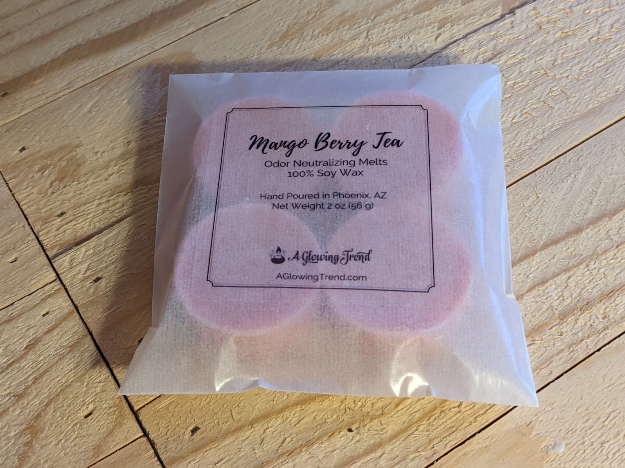 4-pack of light pink odor neutralizing Mango Berry Tea fragranced wax tart melts.
